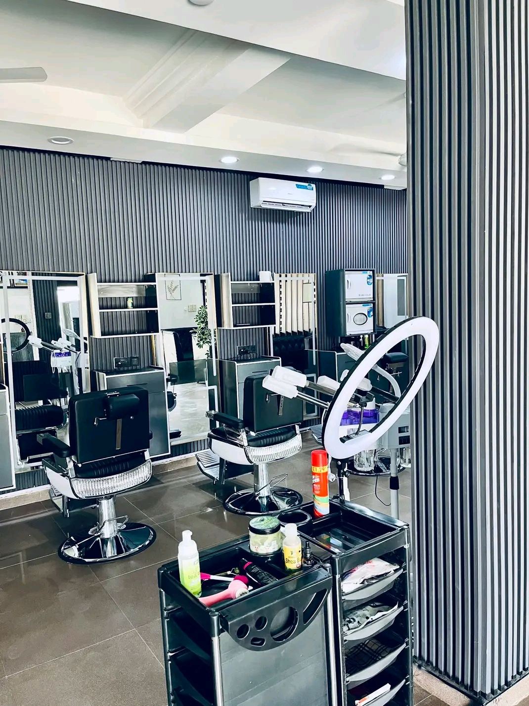 Styling station with ring light at BROX BARBERS